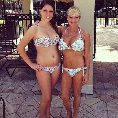 Big breasted MILF and cute daughter