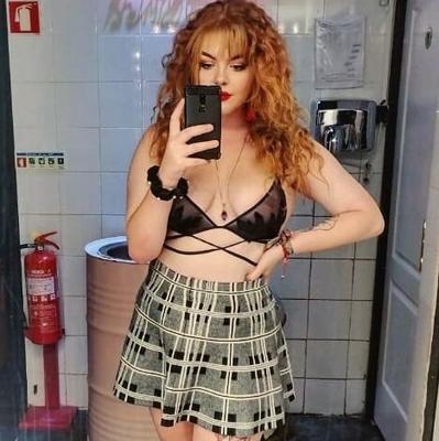 Curvy redhead slut loves showing off her tits to get you hard