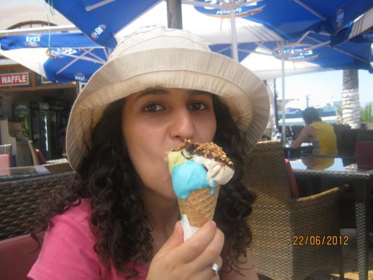 Curly Sweet Girl Eating Icecream