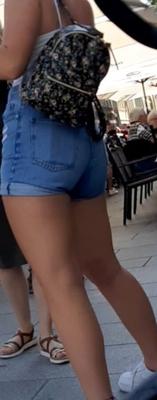 Street Girl in blue jeans shorts