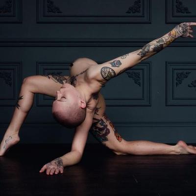 Shaved and tattooed model