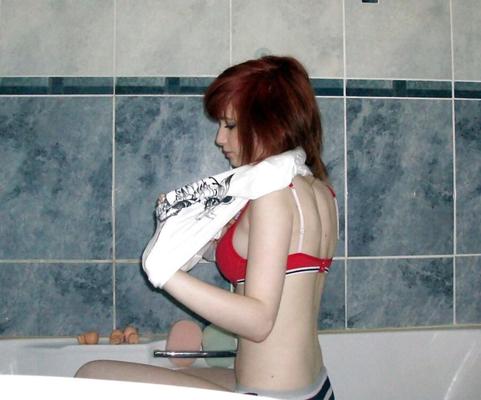 Sexy Young Redhead Posing in the Bath