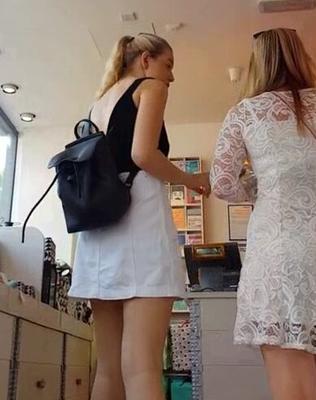 Candid Slut #: Two dumb teen sluts wearing thongs upskirted